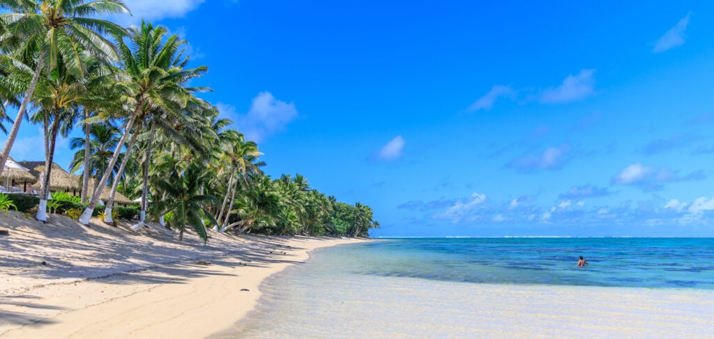 The beach at MOTU Resort on Rarotonga