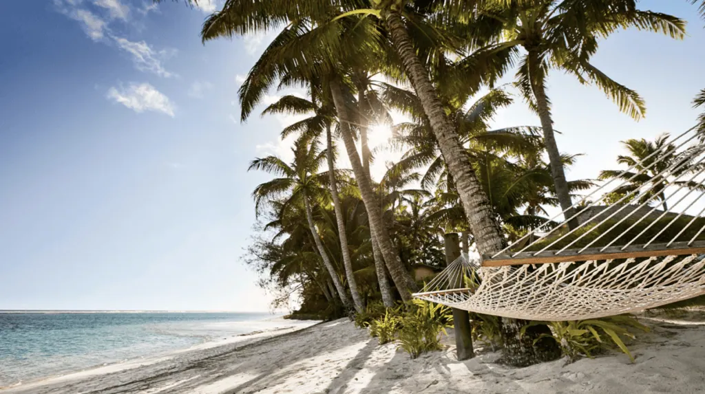 A hammock on the beachfront at MOTU Villas Rarotonga